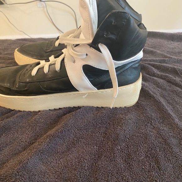 A pair of used sneakers. - Picture 6 of 7